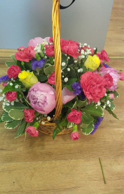 Shades of Pink - Gorgeous basket arrangement to include a nice mix of flowers in all shades of pink.