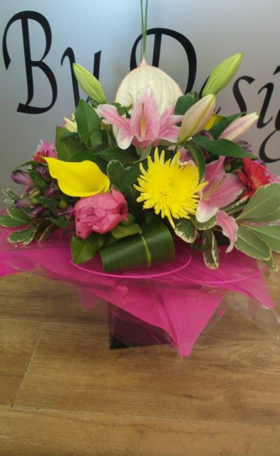 Colour Mix - Lovely flower arrangement present in an aqua box. Nice mix of flowers in pink, whites, yellow with greenery.